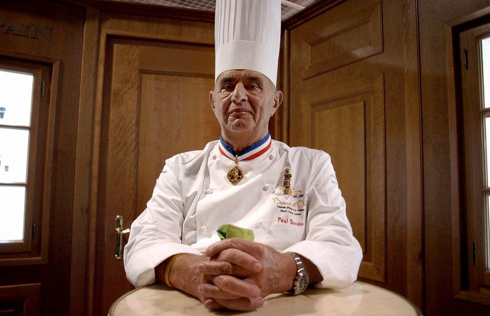 Paul Bocuse in 2007 wearing a tall chef's hat