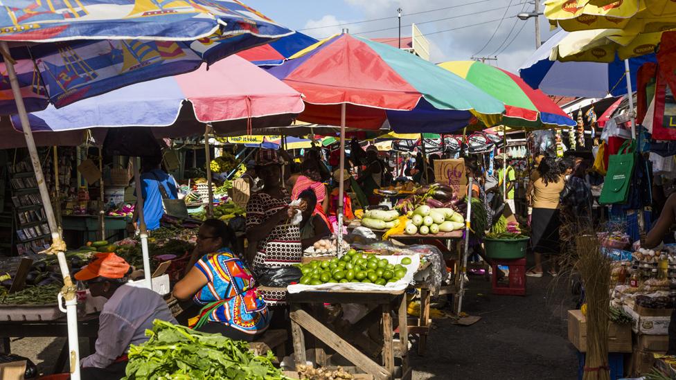 People in a market in Georgetown