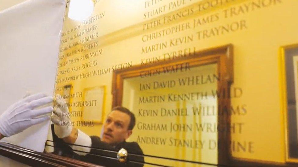 Plaque being unveiled in town hall