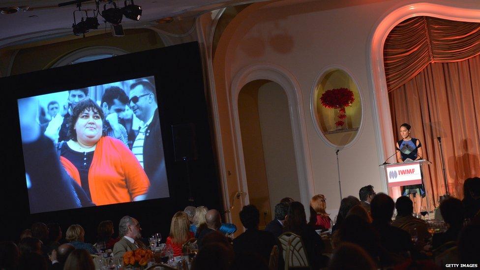 Olivia Munn speaks onstage during the 2012 Courage in Journalism Awards hosted by the International Women's Media Foundation on 29 October 2012 in Beverly Hills, California.