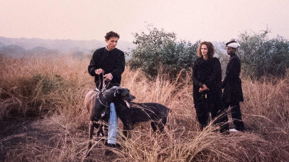 Prince Cyrus with his sister Princess Sakina and their dogs