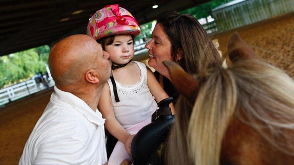 Laney Frohock with her parents