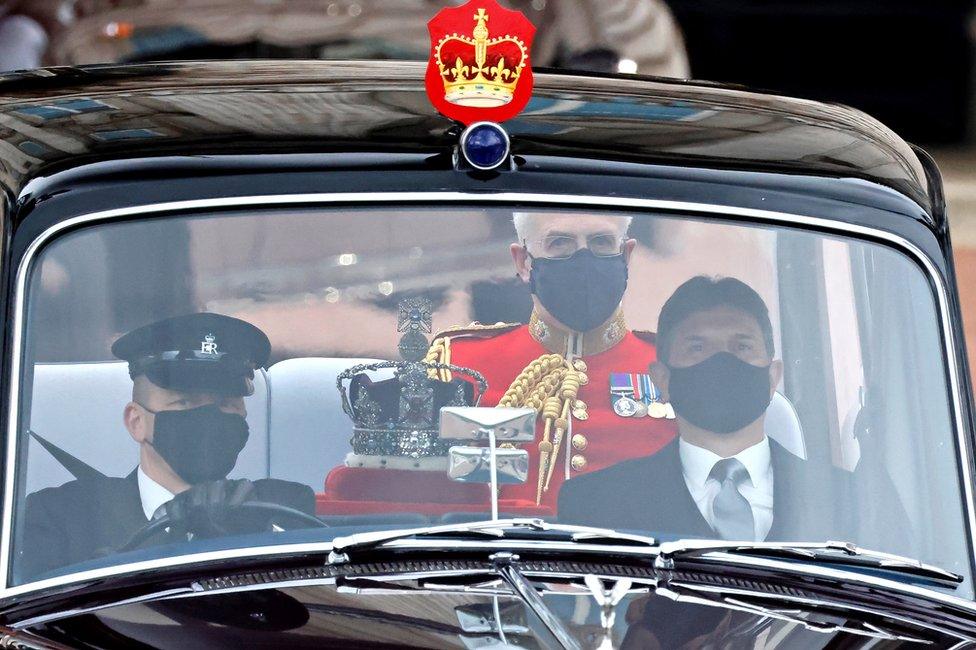 The Imperial State Crown is driven from Buckingham Palace to the Houses of Parliament for the State Opening of Parliament in London on 11 May 2021