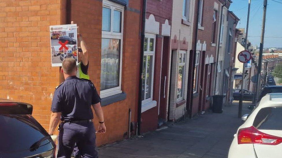 Signs put up where cars are parked at junctions