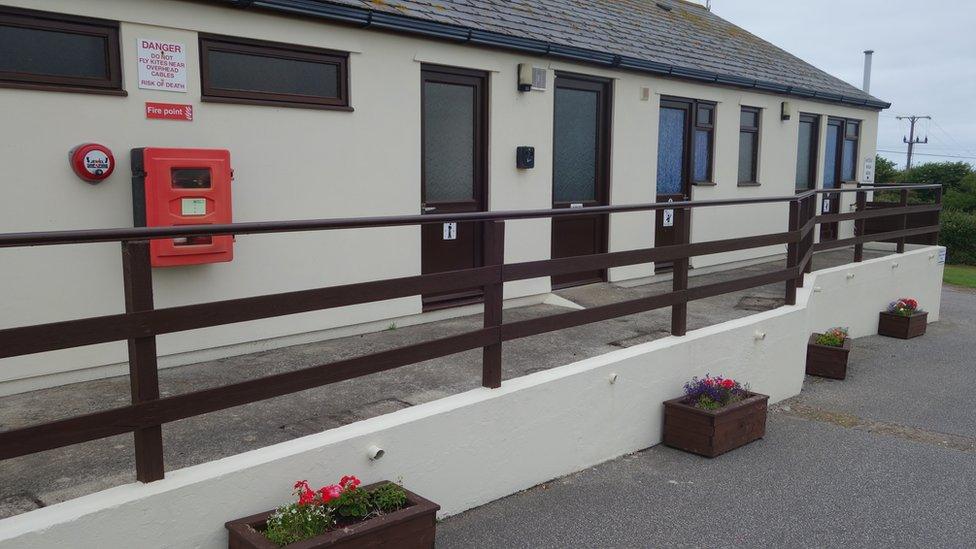 Toilet and shower block