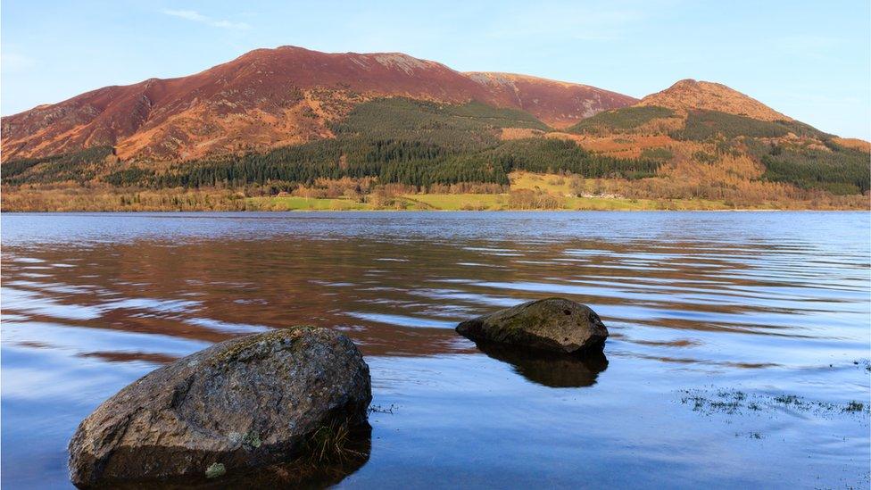 View across Bassenthwaite Lake with Skiddaw mountain in the background.