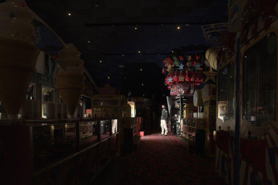 Pierre Oxley inside a closed amusements centre in Clacton