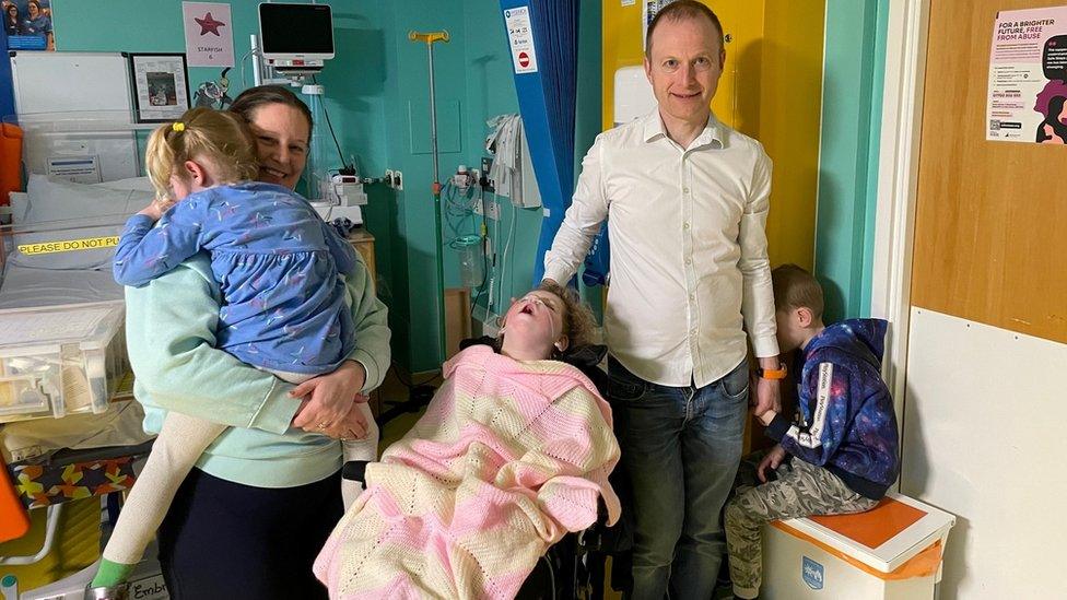 The Treadwell family leaving hospital