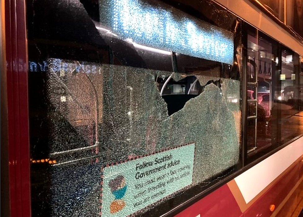 Smashed bus window