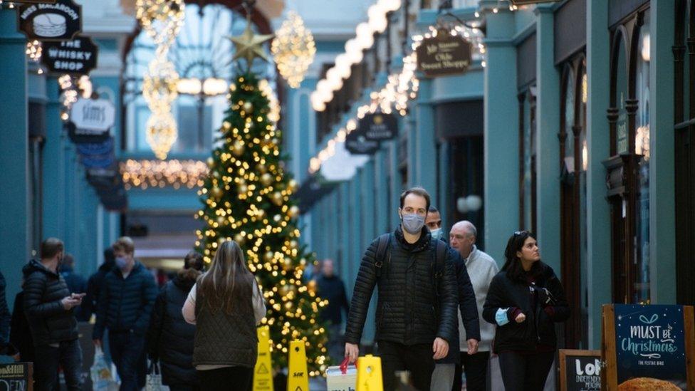 People walk through the Great Western Arcade in Birmingham