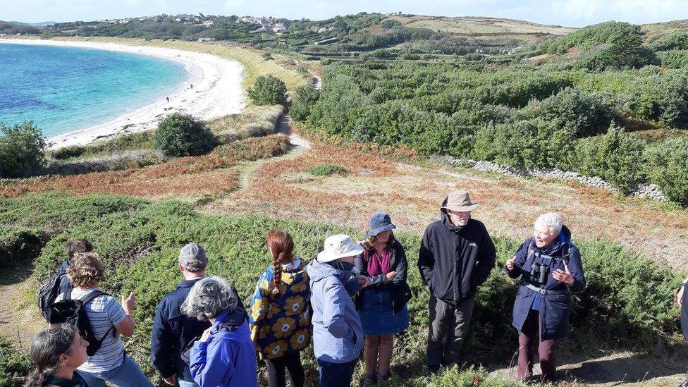 Group of wlkers on St Martin's