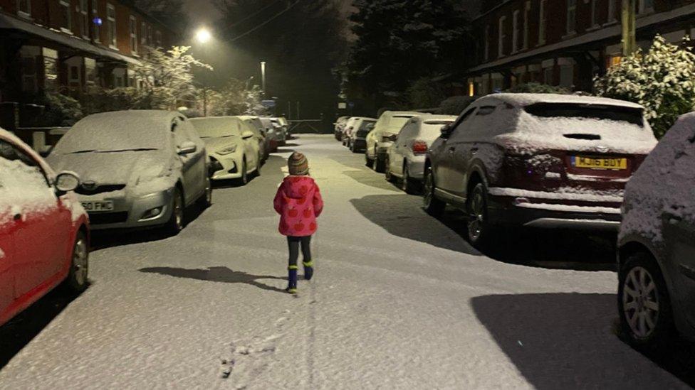 Girl in snowy street