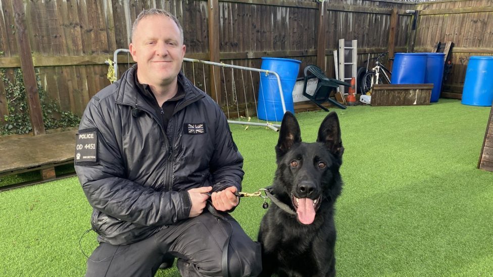 Police dog Mikey with his handler PC Dan Kemble