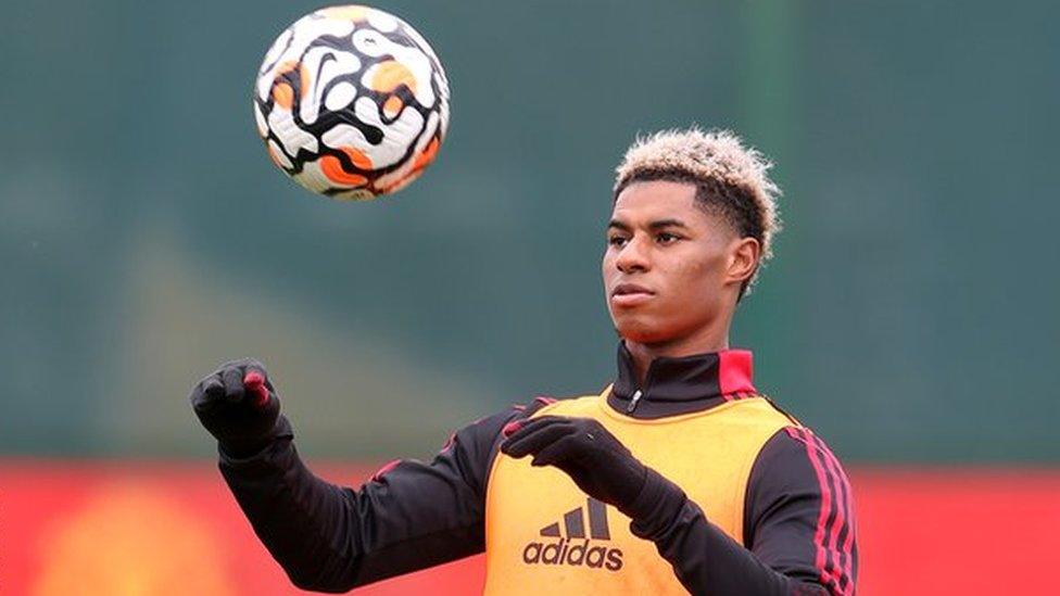 Rashford back in training with United