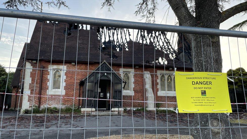 Note asking residents not to enter All Saints Church in Mudeford,