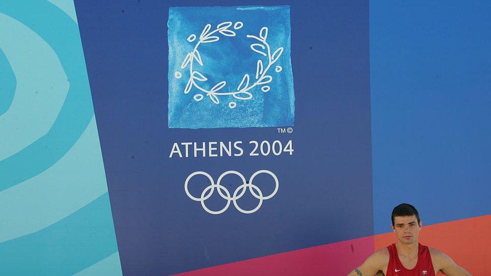 greece-olympic-logo-and-man.