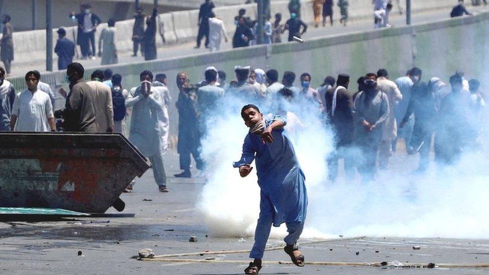 Thousands of Imran Khan supporters took to the streets following the brief arrest of the former Pakistani prime minister on 9 May