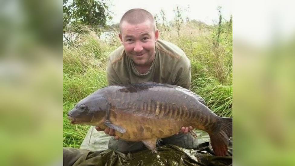 Terry Ricketts holding a large fish