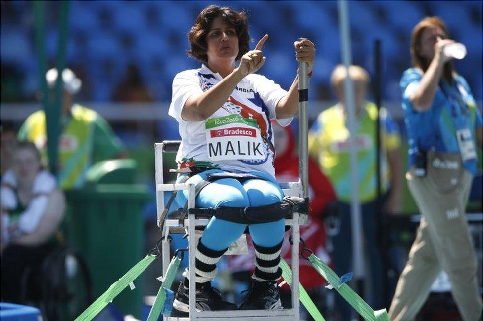 India"s Deepa Malik gestures as she competes in the women"s final shot put F53 athletics event during the Paralympic Games at the Olympic Stadium in Rio de Janeiro, Brazil, Monday, Sept. 12, 2016.