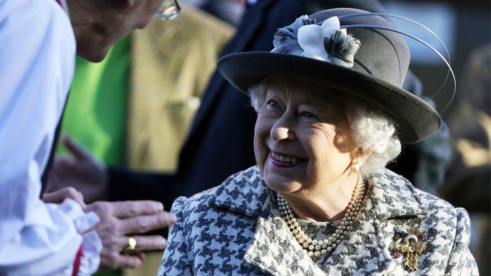 Britain's Queen Elizabeth II leaves after a service at St Mary the Virgin church, Hillington, Norfolk