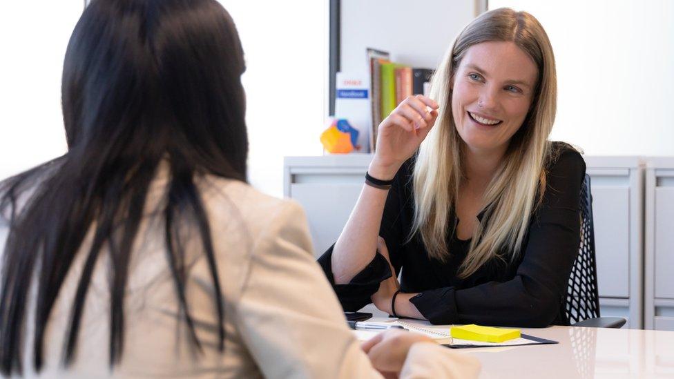 Two women in an office