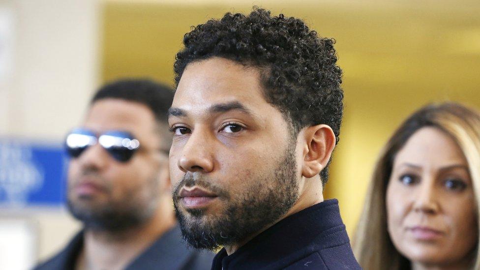 Smollett looks at the camera