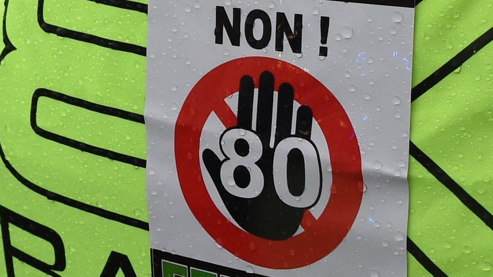 A biker bears a sticker during a demonstration against the 80km/h speed limit in January 2018 in Agen, southern France