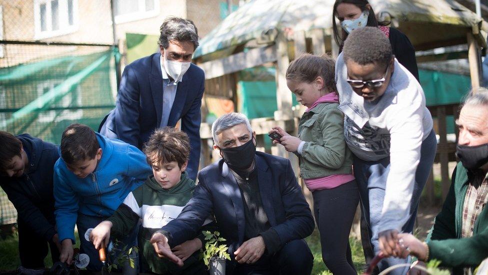 Sadiq Khan at a school garden with students