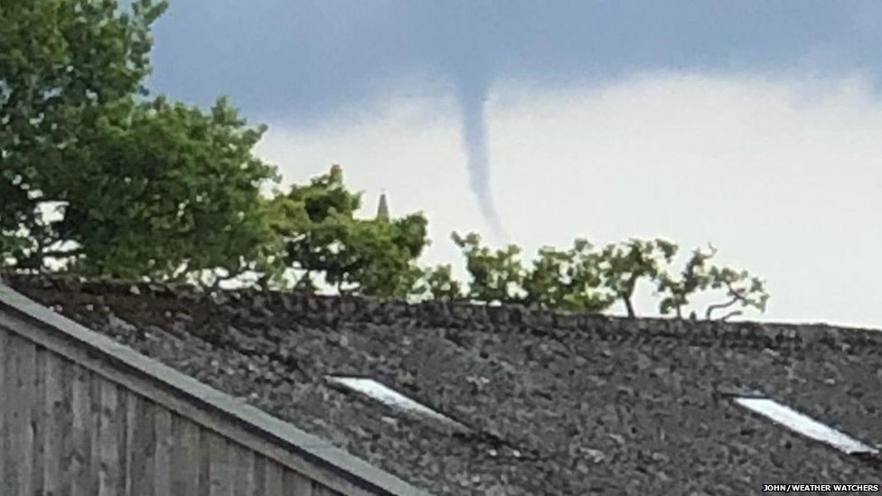 Funnel shaped cloud in the sky