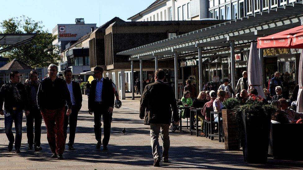 people on a street in Wolfsburg