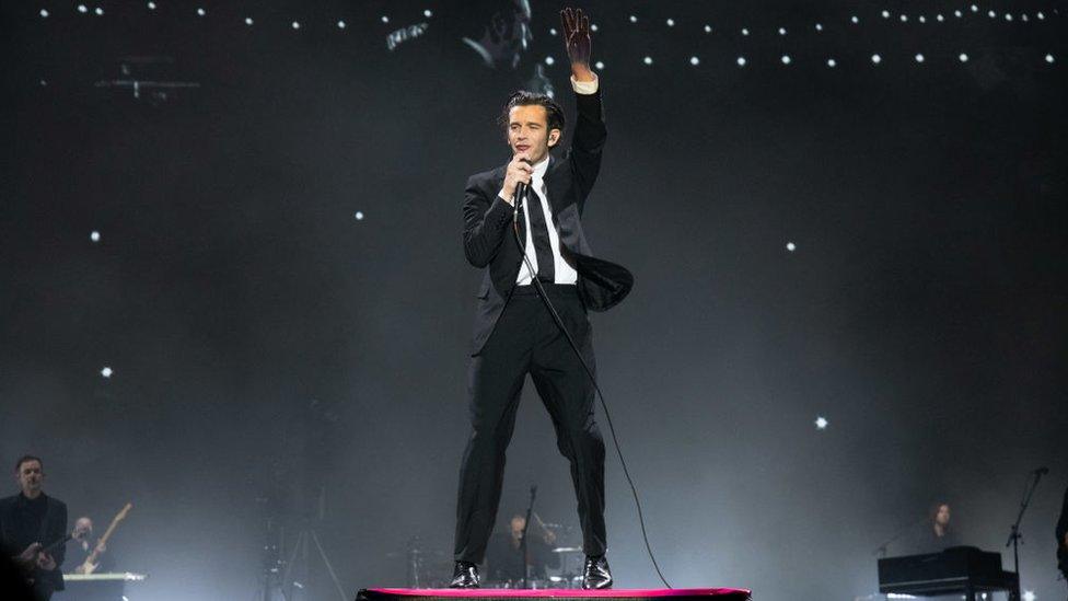 Matty Healy of The 1975 performs on the main stage during Reading Festival