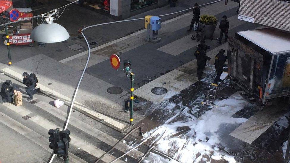 A view of the site where a lorry drove into a crowd and into a department store in central Stockholm, Sweden