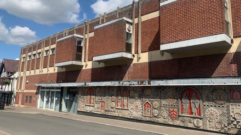 the mural which is on the Hare Lane side of the building