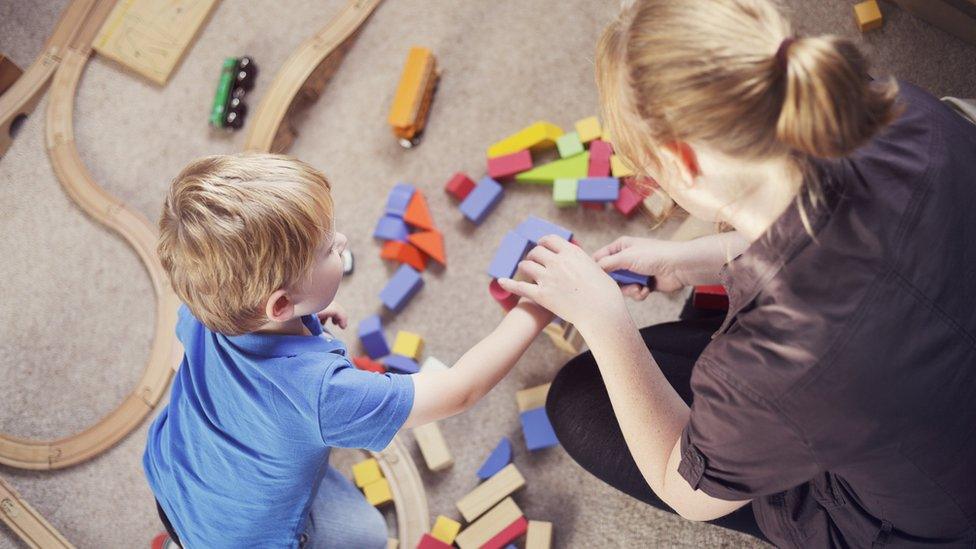 Child playing with toys