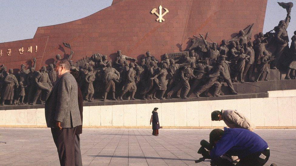 A BBC cameraman films in North Korea