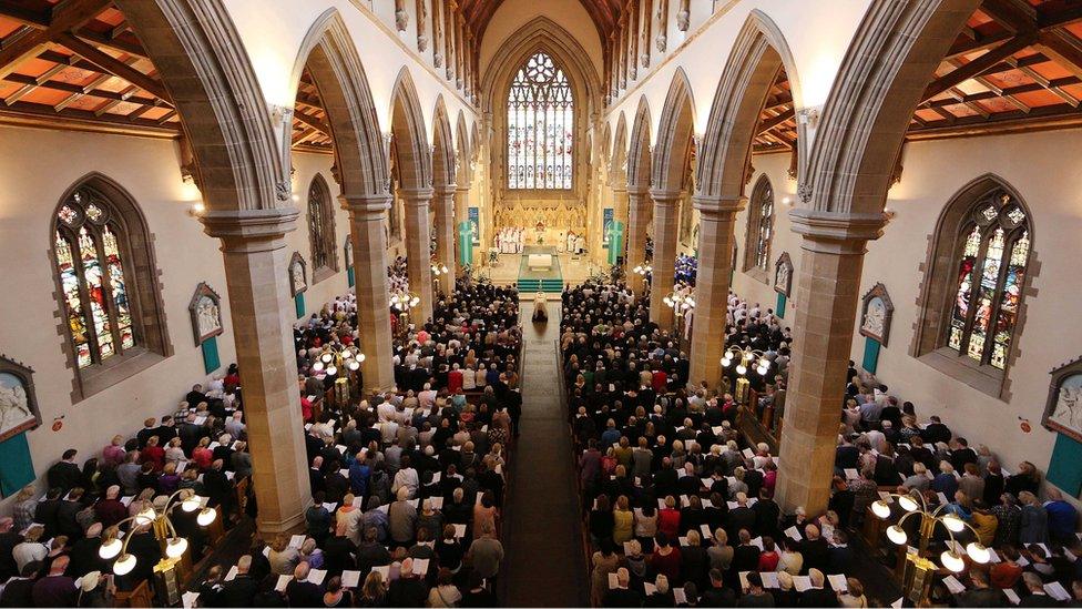 Mourners at the funeral service at St Eugene's Cathedral