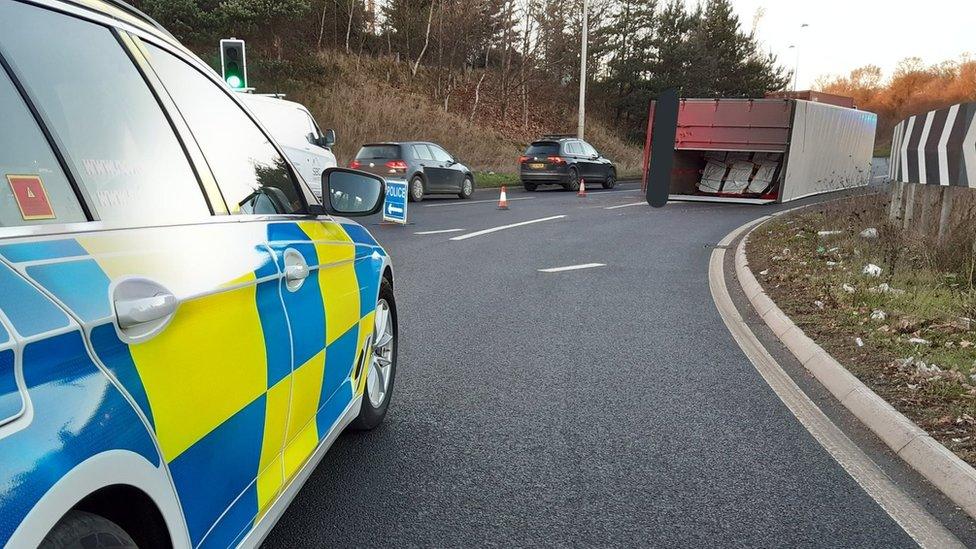 Lorry overturned on a roundabout