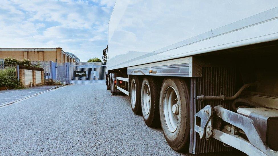 Tom's lorry parked at a supermarket HGV gate