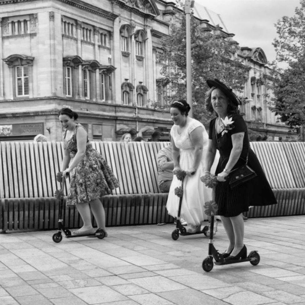 A bride Scooting through the city centre