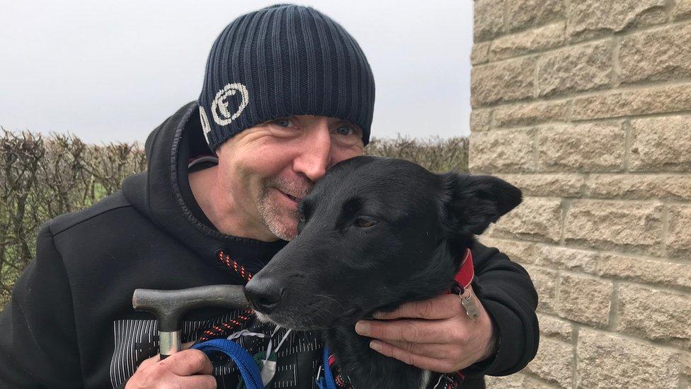 Jules Allan with his support dog Bella