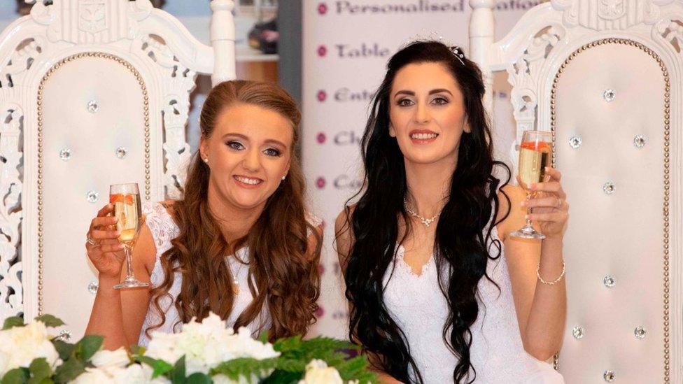 Robyn Peoples (left) and Sharni Edwards (right) pose for the media after becoming the first same-sex couple to get married in Northern Ireland in Carrickfergus, on 11 February 2020