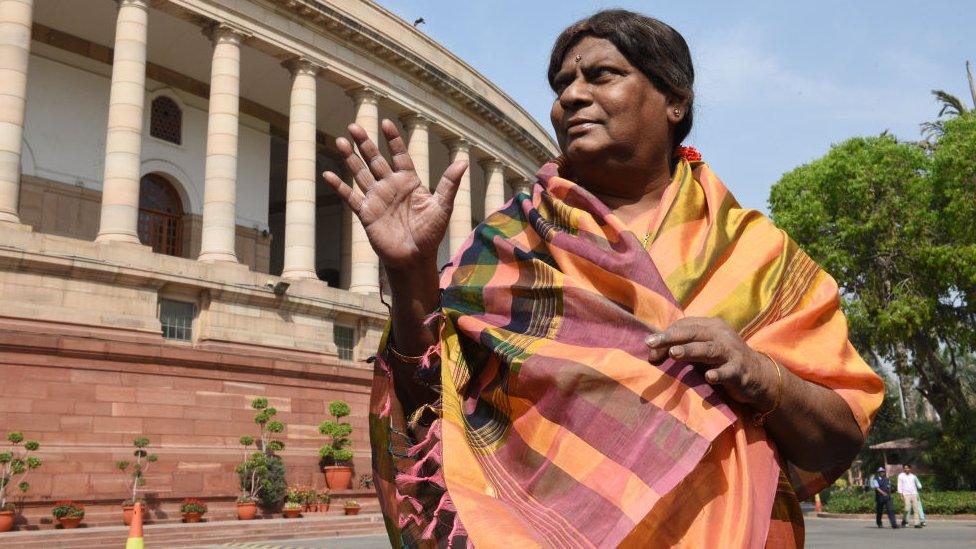 Mr Sivaprasad attends parliament wearing a sari on 31 March 2018 in Delhi.