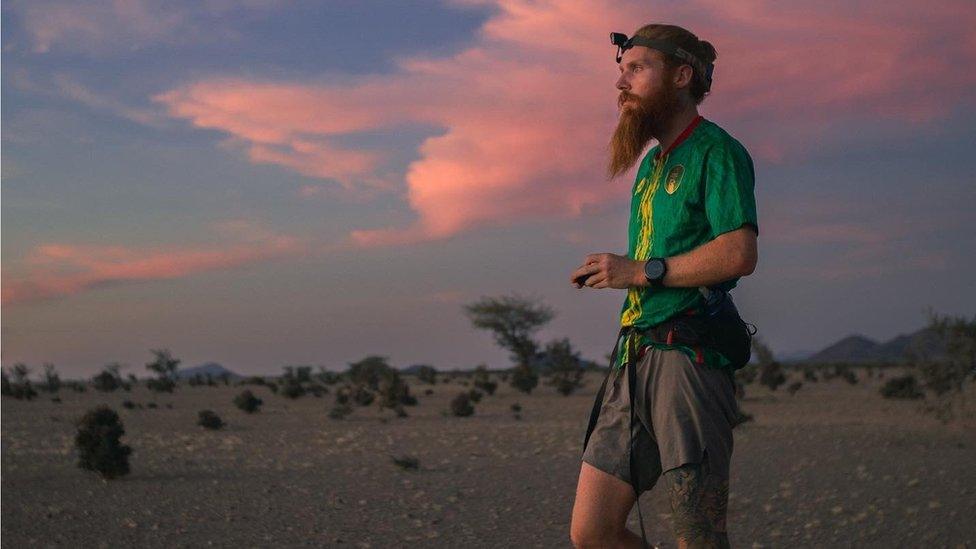 Russell Cook running in Africa