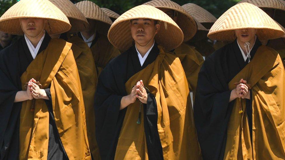 Japanese Buddhist Monks seen near the main temple of Jodo-shu Buddhism