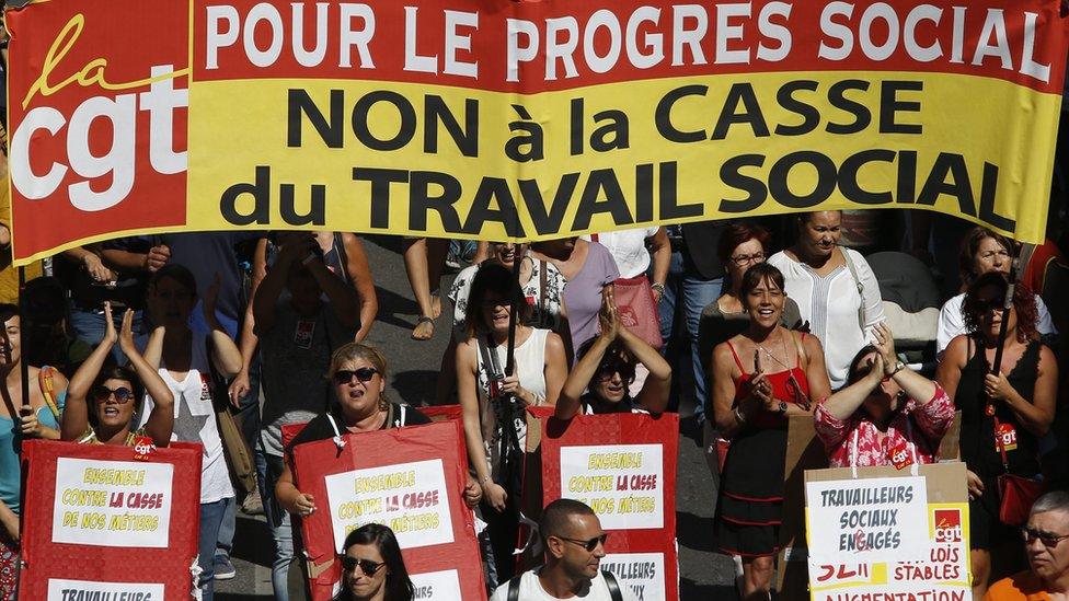 Women attend a demonstration in Marseille