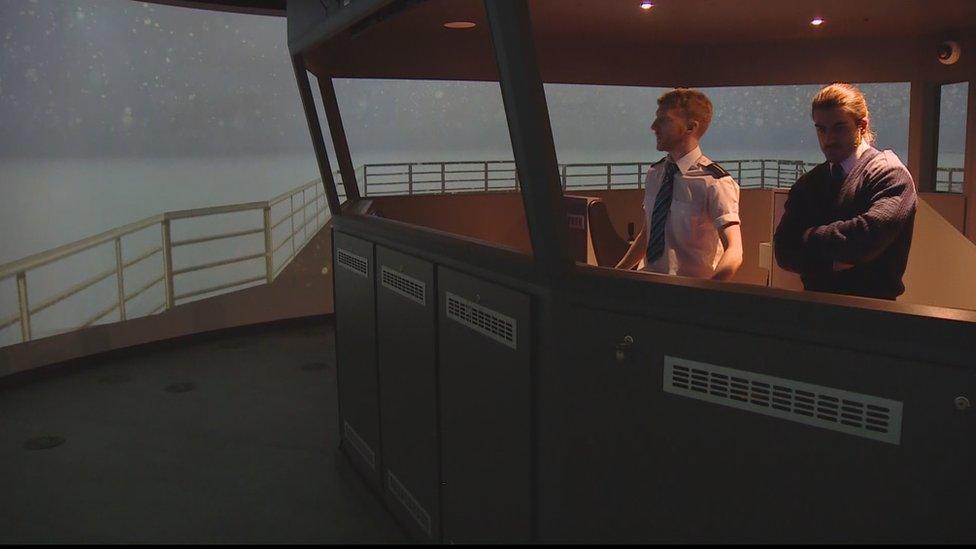 crew on ship simulator