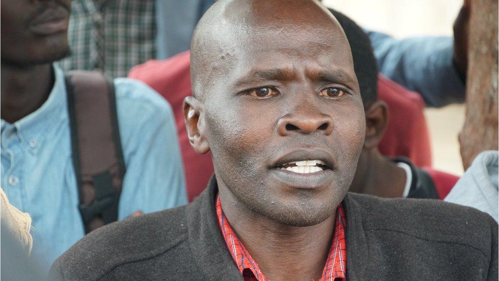 Dan Langat talks to a group of locals in Eldoret town