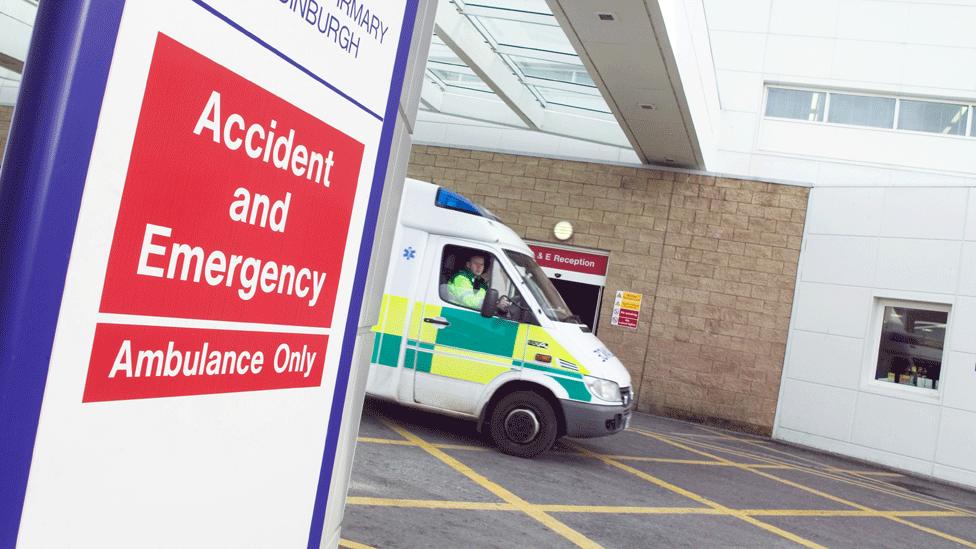 Ambulance at hospital entrance