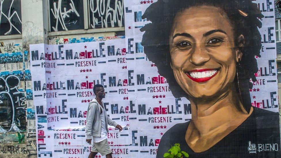 A wheat-paste piece of street art by artist Luis Bueno shows the councilwoman from Rio de Janeiro Marielle Franco.