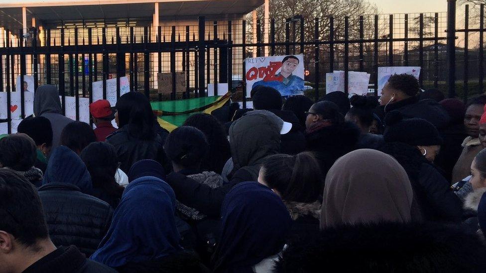 Friends pay tribute outside the school